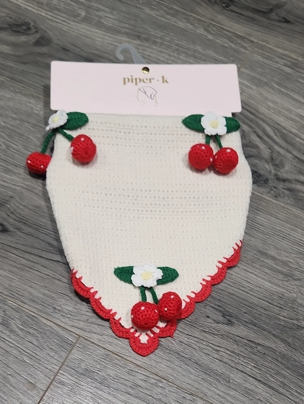 Piper NWT Crochet Cream Bib with Red Cherry Accents